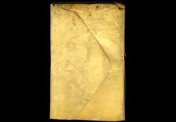 A digitized image of an 18th century ledger book wrapped in a vellum envelope.