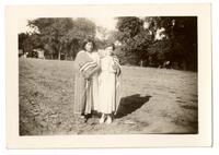 12. Anna Bassett and unidentified woman