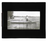 Lantern Slide #231: Montagnais-Naskapi man in canoe