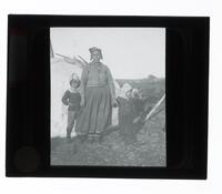 Lantern Slide #259: Montagnais-Naskapi woman, children