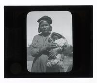 Lantern Slide #293: Montagnais-Naskapi woman with baby in sack