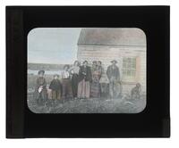 Lantern Slide #356: Group portrait, outside dwelling