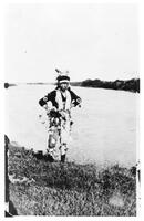 F-254: Man in dance costume, Rainy River