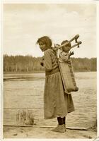 F066: Woman with tikanagan, Pauingassi, Manitoba, 1933