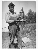 A019: Joe Berens with tame owl, Berens River, Manitoba, circa 1930-1933