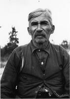 A010: Chief William Berens, seated outside, Berens River, Manitoba, circa 1930 or 1938