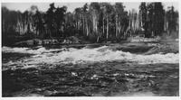 A067: En route on Berens River, Sharp Rock Rapids, Manitoba, 1933