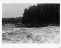 A062: En route on Berens River, rapids, Manitoba, circa 1930s