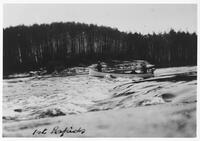 A054: En route on Berens River, shooting first rapids, Manitoba, circa 1930s