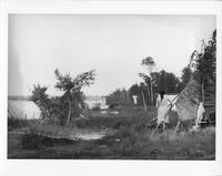 A334: Ojibwe woman at camp at Treaty time, Pikangikum, Ontario, 1940