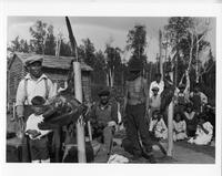 A167: Getagaash Keeper and Alex Keeper (Giiwiich), preparation for Dream Dance Ceremonies, Little Grand Rapids, Manitoba, circa 1930s