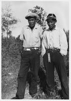 A146: Two Ojibwe men, standing outside, Little Grand Rapids, Manitoba, circa 1930s