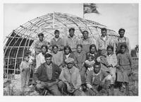 A201: Ogichidaag and Ogichidaakweg (Warriors) in front of Naamiwan's Waabano lodge, Pauingassi, Manitoba, 1933