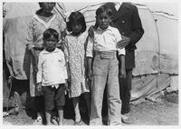 A117: Alexander Bushie (Noojibine), his wife Miizhakii, and their three children, Little Grand Rapids, Manitoba, circa 1930s