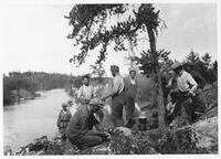 A060: Ojibwe group tea break, en route on Berens River, Manitoba, circa 1930s