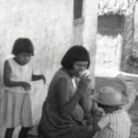 Xavante woman with children