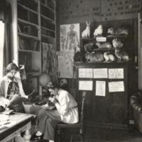 Two young researchers in laboratory setting.