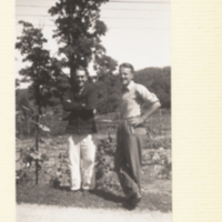 Dr. J.W. Gowen and Alvin Nason standing outside near plants.