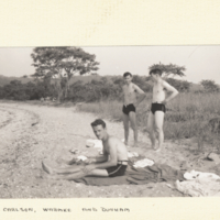 Carlson, Warmke and Dunham outdoors in bathing suits.