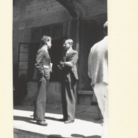 L. C. Dunn and E. Caspari standing outside, in coversation.