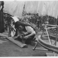 Peguche (?) woman, working with wood.