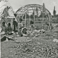 A-098: Ojibwa, Little Grand Rapids, finished waaginogaan frame, with small boy