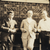 Stanford, Gary and Chambers, standing outside.