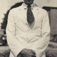 Harvey, standing outside, Woods Hole, 1921.