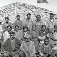 A-201: Ojibwa, Pauingassi, Ogichidaag and Ogichidaakweg (Warriors) in front of Naamiwan's (Fairwind's) Waabano lodge