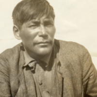 6-12-q: Half length portrait of man, sitting outside, Ungava, Canada.