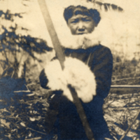 6-13-l: Full length view of boy standing outside