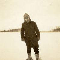 6-12-l: Frank Speck, standing outside in snow shoes, Sebec Lake, Maine, 1916.