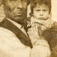 9-13-m: Joseph Mary Soloman holding his grandson Teddy Soloman