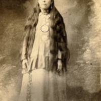 9-5-c: Penobscot woman in characteristic attire of historic period.