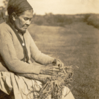 9-2-e: Alice Swassion making a bag of basswood.