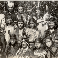 9-2-i: Penobscot women and children, group portrait in traditional attire, postal card.