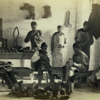 Indian boys at work in shoe-makers shop at Carlisle Barracks