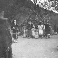 Tepecano procession with masked figure