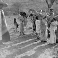 Tepecano children carrying stones