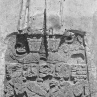 Mayan glyphs with stone figure