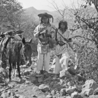 Two Tepecano men with donkey