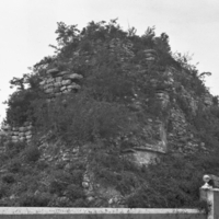 Mayan ruins with wall, windmill