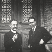 Niels Bohr and A. Sommerfeld, half length, informal, standing.