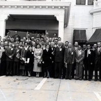 W. F. G. Swann and others, group portrait, standing outside.