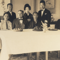 Joselph Russell Smith, seated at table in Okaya, Japan, 1925.