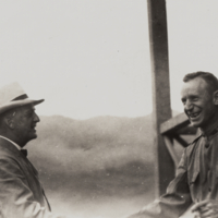 W. Cameron Forbes (?) shaking hands with unidentified man.