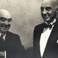 Heiser in tuxedo with unidentified man.