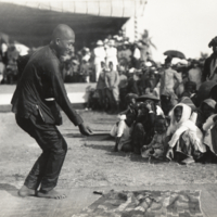 Man dancing before a crowd, Zamboanga, 1914