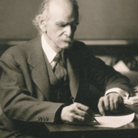 F8.1.19 Franz Boas, writing at desk.