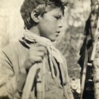 6-9-p: Innu boy with snowshoe